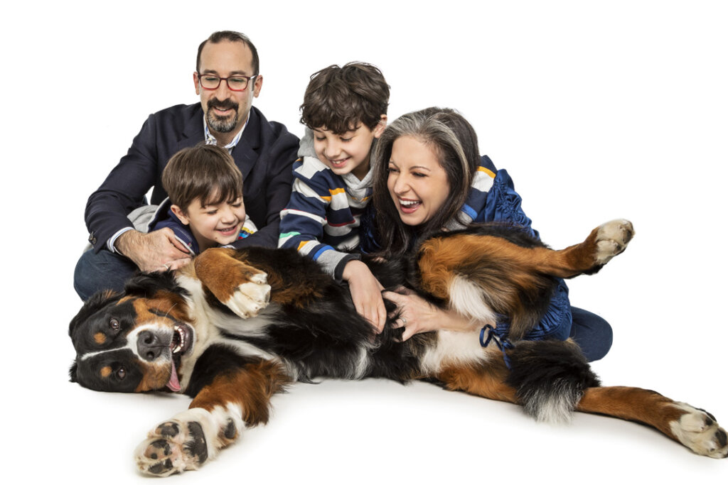 A family of four and a dog